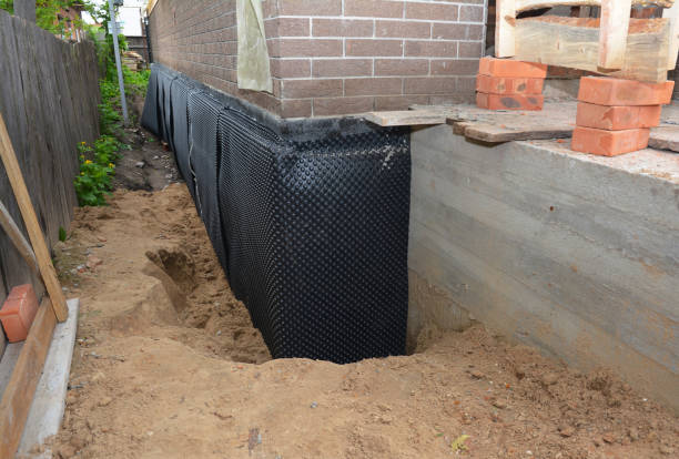 Happy homeowners after waterproofing job in Crawford